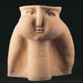 Flower pot with a female head