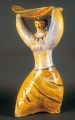 Female figurine holding a bowl